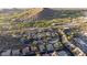 Expansive golf course and mountain aerial view over desert community at 9548 E Kiva Ln, Gold Canyon, AZ 85118