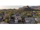 Two story home in desert mountain community with lush landscape at 9548 E Kiva Ln, Gold Canyon, AZ 85118