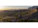 Scenic desert mountain aerial view over community with lush golf course at 9548 E Kiva Ln, Gold Canyon, AZ 85118
