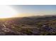 Expansive aerial shot of the desert landscape, golf course and community at 9548 E Kiva Ln, Gold Canyon, AZ 85118