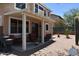 Relaxing back patio with a covered pergola and comfortable seating, perfect for enjoying the desert landscape at 9548 E Kiva Ln, Gold Canyon, AZ 85118