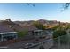 Backyard showcasing desert plants and distant mountain views, creating a beautiful and serene outdoor setting at 9548 E Kiva Ln, Gold Canyon, AZ 85118