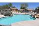 Enjoy the community pool with a desert view at 9548 E Kiva Ln, Gold Canyon, AZ 85118