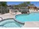Community pool and spa with serene mountain views in a gated community at 9548 E Kiva Ln, Gold Canyon, AZ 85118
