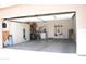 Spacious garage with ample storage cabinets and shelving at 9548 E Kiva Ln, Gold Canyon, AZ 85118