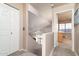 Hallway with a view of the staircase, bedroom and neutral-colored carpet at 9548 E Kiva Ln, Gold Canyon, AZ 85118