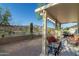 Inviting covered patio with comfortable seating, offering scenic desert views and outdoor relaxation at 9548 E Kiva Ln, Gold Canyon, AZ 85118