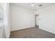 Bedroom with a ceiling fan, plush carpet, and natural light at 10158 W Angels Ln, Peoria, AZ 85383