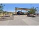 Community playground with modern play structures, covered shelter, and comfortable walking path at 10158 W Angels Ln, Peoria, AZ 85383