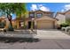 Charming two-story home with a well-maintained yard and desert landscaping at 10329 E Star Of The Desert Dr, Scottsdale, AZ 85255