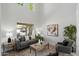 Comfortable living room with neutral tones, ample seating, and natural light at 10329 E Star Of The Desert Dr, Scottsdale, AZ 85255