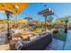 Inviting outdoor patio with comfortable seating, heaters, and scenic mountain views at 10329 E Star Of The Desert Dr, Scottsdale, AZ 85255
