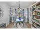 Cozy dining area with a round table, stylish chairs, and bright natural light at 10951 E Delta Ave, Mesa, AZ 85208