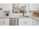 Bright kitchen featuring quartz countertops, modern fixtures, and stainless steel appliances at 10951 E Delta Ave, Mesa, AZ 85208