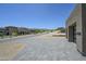 Expansive, modern home featuring paver driveway and desert landscaping in an upscale neighborhood at 13290 E La Junta Rd, Scottsdale, AZ 85255