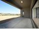 Expansive covered patio offering outdoor living space with views of the surrounding landscape and blue skies at 13290 E La Junta Rd, Scottsdale, AZ 85255