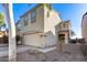 Lovely home showcasing a two-car garage, easy desert landscaping, and a stucco finish at 13585 N 87Th Dr, Peoria, AZ 85381