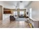 Open-concept living room featuring tiled flooring and natural light at 13585 N 87Th Dr, Peoria, AZ 85381