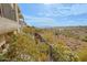 Spacious backyard with desert landscaping and wrought iron fencing featuring mountain views at 14850 E Grandview Dr # 138, Fountain Hills, AZ 85268