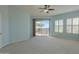 Bedroom with sliding glass door leading to balcony with beautiful outdoor views and sunlight at 14850 E Grandview Dr # 138, Fountain Hills, AZ 85268