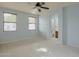 Cozy bedroom featuring two large windows and light blue walls offering a serene and relaxing atmosphere at 14850 E Grandview Dr # 138, Fountain Hills, AZ 85268