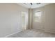 Bedroom featuring a carpet flooring, neutral colored walls, and natural light from one window at 15105 W Glenrosa Ave, Goodyear, AZ 85395