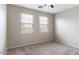 Neutral bedroom featuring carpet, natural light and open space at 15105 W Glenrosa Ave, Goodyear, AZ 85395