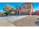 Charming two-story home with attached two-car garage and well-maintained front yard at 15105 W Glenrosa Ave, Goodyear, AZ 85395