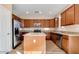 Beautiful kitchen with stainless steel appliances, granite countertops, and ample cabinetry at 15105 W Glenrosa Ave, Goodyear, AZ 85395