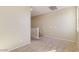 Upstairs loft space with neutral carpet, offering a cozy and versatile area at 15105 W Glenrosa Ave, Goodyear, AZ 85395