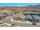 Beautifully designed community featuring well-maintained homes, sidewalks, and streets with stunning desert mountain views at 15817 S 177Th Dr, Goodyear, AZ 85338