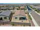 Aerial view of a backyard with a covered patio and gravel landscaping in a desert community at 15817 S 177Th Dr, Goodyear, AZ 85338