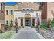 Welcoming community center entrance featuring stone accents, manicured landscaping, and convenient access for residents at 15817 S 177Th Dr, Goodyear, AZ 85338