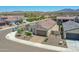Attractive one-story home boasting a well-kept desert front yard and spacious driveway, offering curb appeal and convenience at 15817 S 177Th Dr, Goodyear, AZ 85338