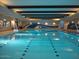 Stunning indoor pool area with modern design, ample lighting, and relaxing ambiance for year-round enjoyment at 15817 S 177Th Dr, Goodyear, AZ 85338