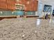 Kitchen featuring expansive granite countertops, stainless steel appliances, and seamless access to living area at 15817 S 177Th Dr, Goodyear, AZ 85338