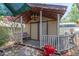 Backyard shed with covered patio and mature landscaping at 1702 W Monterosa W St, Phoenix, AZ 85015