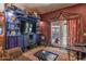 Inviting living room featuring custom built-ins, backyard access, and refined decor at 1702 W Monterosa W St, Phoenix, AZ 85015