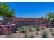 North Copper Canyon community signage amidst desert landscaping and a stone block perimeter wall at 17373 W Jessie Ln, Surprise, AZ 85387