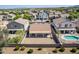 Spacious backyard featuring a refreshing pool and a covered patio, perfect for outdoor relaxation at 17844 W Caribbean Ln, Surprise, AZ 85388