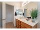 Bathroom featuring vanity, framed mirror, decor and bath towel at 17844 W Caribbean Ln, Surprise, AZ 85388