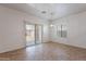 Open dining area features sliding glass doors to the backyard at 17844 W Caribbean Ln, Surprise, AZ 85388