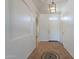Bright foyer with decorative tile inlay and neutral paint at 17844 W Caribbean Ln, Surprise, AZ 85388