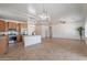 Open concept living space adjacent to the kitchen, ideal for entertaining at 17844 W Caribbean Ln, Surprise, AZ 85388
