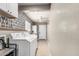 Functional laundry room featuring modern washer, dryer, and complementary storage at 18233 N 55Th Dr, Glendale, AZ 85308