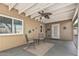 Cozy covered patio with ceiling fan providing an inviting space to relax outdoors at 18233 N 55Th Dr, Glendale, AZ 85308