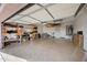 A spacious garage features ample storage shelving, epoxy flooring, and a clean workspace for projects and organization at 1834 W Nighthawk Way, Phoenix, AZ 85045