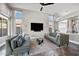 Bright living room with wood floors, vaulted ceilings, neutral walls, modern design and backyard access at 1834 W Nighthawk Way, Phoenix, AZ 85045