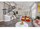 Spacious living room with high ceilings, a staircase, and stylish decor at 1834 W Nighthawk Way, Phoenix, AZ 85045