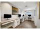 Office space featuring white cabinets, long countertops, and hardwood flooring at 1834 W Nighthawk Way, Phoenix, AZ 85045